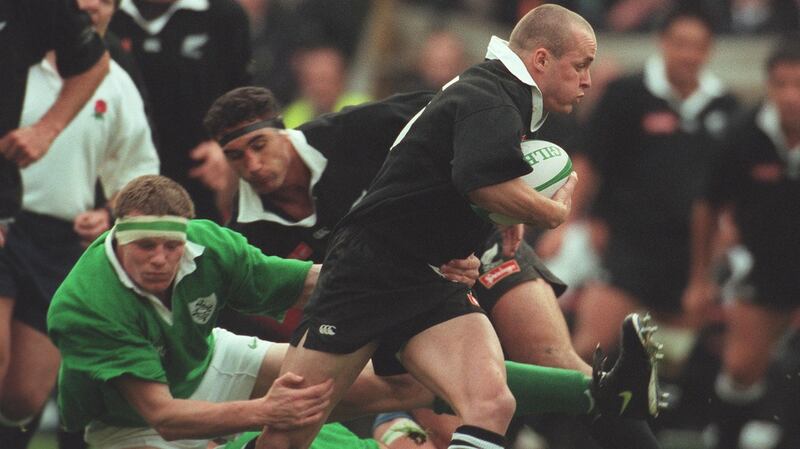 Ireland’s Malcolm O’Kelly and New Zealand’s Christian Cullen in November 1997. Photograph: Lorraine O’Sullivan/Inpho