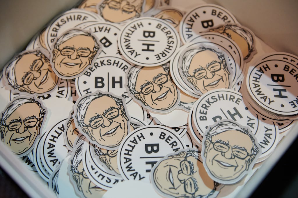 Berkshire-themed stickers on the exhibition floor during the Berkshire Hathaway annual shareholders meeting in Omaha. Photographer: Dan Brouillette/Bloomberg