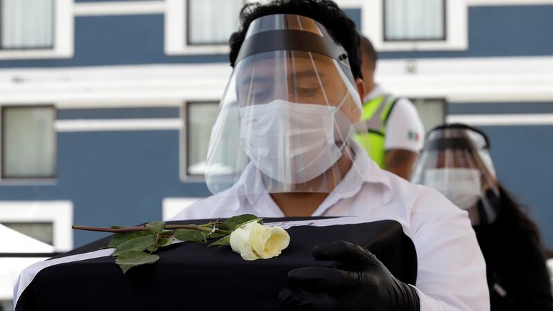 Urns with the ashes of migrants who died with Covid-19 in the United States arrive in Puebla, Mexico, on Monday. Over 100 urns containing the ashes of migrants who died in Connecticut, New Jersey and New York were delivered to their families in Mexico. Photograph: EPA