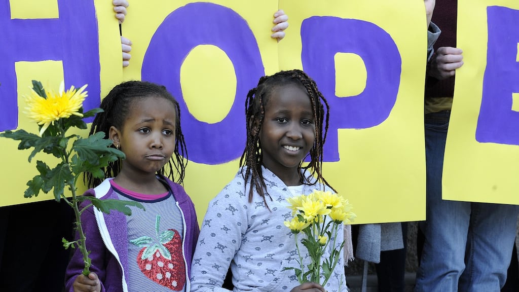 Stephanie (5) and Tatyana (8) N’Gang’a, take part in a protest outside the Department of Justice last year over the treatment of asylum-seekers . Photograph: Dave Meehan/The Irish Times