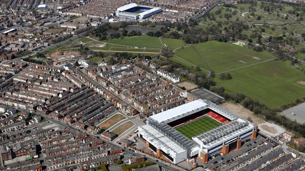 The stadiums of Liverpool and Everton, Anfield (foreground) and Goodison Park respectively, separated by Stanley Park in the city of Liverpool. Photograph: Jonathan Webb/Getty Images.