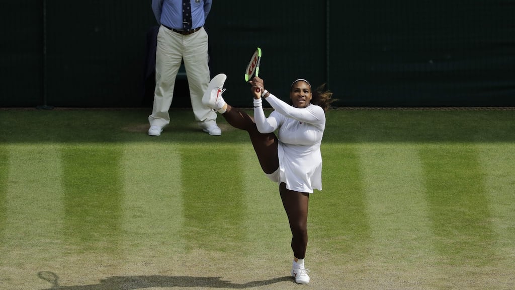 Serena Williams returns a shot against Julia Goerges during their women’s singles semi-final at Wimbledon. Photo: Ben Curtis/Getty Images