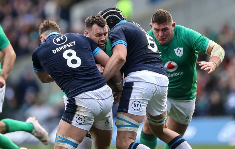 Cian Healy in action against Scotland's Jack Dempsey and Jonny Gray. Photograph: James Crombie/Inpho