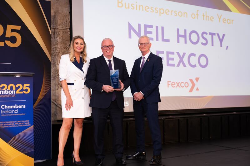 Anna Daly, MC of the awards; Neil Hosty, chief executive at Fexco; and Ian Talbot, chief executive of Chambers Ireland. Photographer: Ruben Morrissey-Fernandez/Ruby Productions