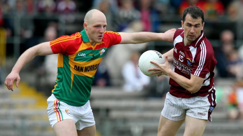 Westmeath’s Dessie Dolan is tackled by Shane Mernagh of Carlow at Cusack Park. Photograph Lorraine O’Sullivan/Inpho