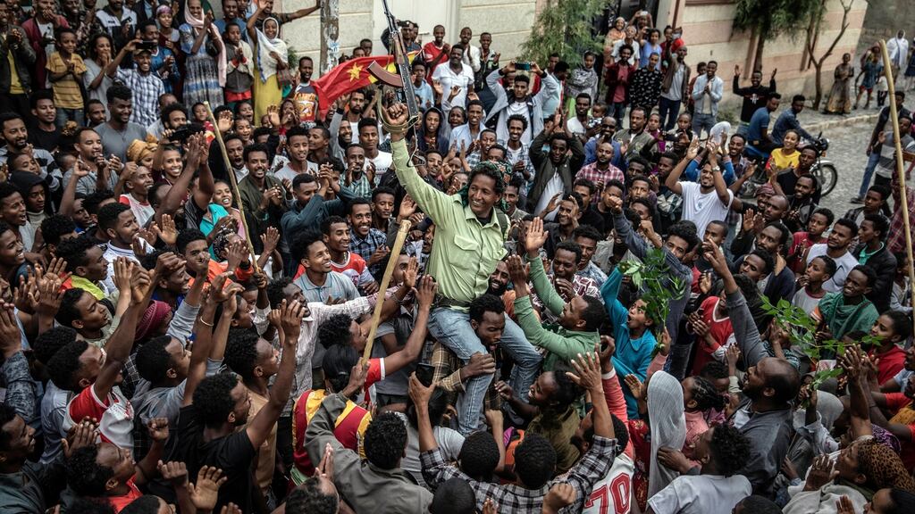 People celebrate the arrival of rebel Tigray People’s Liberation Front in Mekelle on Tuesday. Photograph: Finbarr O’Reilly/The New York Times