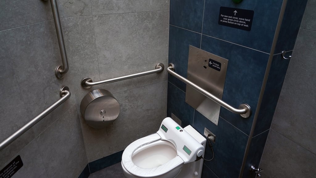 Flushing a toilet can generate a cloud of aerosol droplets that rises nearly three feet. Photograph: Chang W. Lee/The New York Times