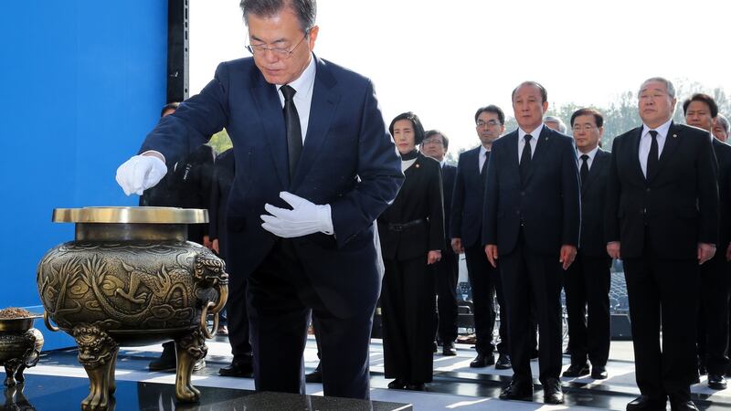 South Korean president Moon Jae-in burns incense at a national cemetery in northern Seoul, South Korea, on Thursday to mark the anniversary of the 19 April Revolution, a popular pro-democracy and anti-dictatorship uprising in 1960. Photograph: EPA/Yonhap