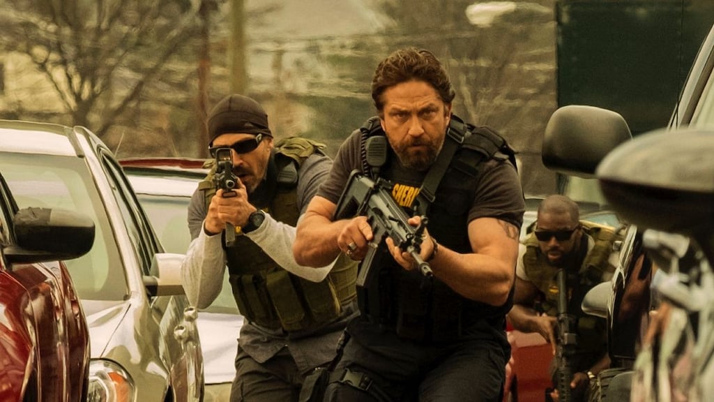 Suspend your disbelief: Maurice Compte and Gerard Butler  in Den of Thieves. Photograph: STXfilms