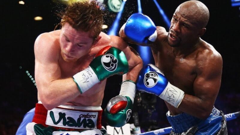 Floyd Mayweather Jr on his way to victory over Saul Alvarez in 2017. Photograph: Al Bello/Getty