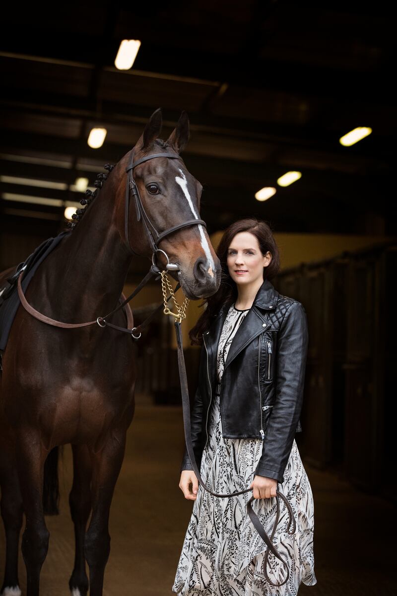 Rachael Blackmore (with Westen Love): printed dress with handkerchief hem, LK Bennett, €310; black soft leather jacket, All Saints, €270