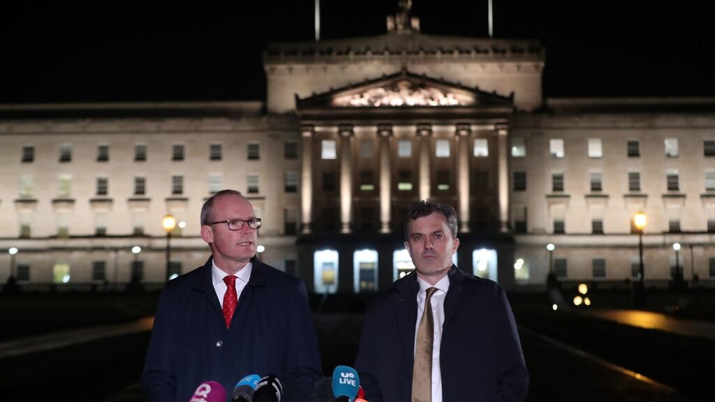 Tánaiste Simon Coveney and Northern Secretary Julian Smith issue a statement outside  Stormont on Thursday night. Photograph: Niall Carson/PA Wire