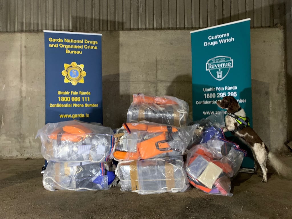 The packages of cocaine found on Tuesday on board the MV Verila at Foynes Port, alongside sniffer dog Harley. Photograph: An Garda Síochána