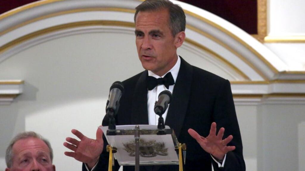 Bank of England Governor Mark Carney forecast that inflation will pick up later this year and move toward the 2 per cent goal in 2016. (Photograph: Neil Hall/Reuters)