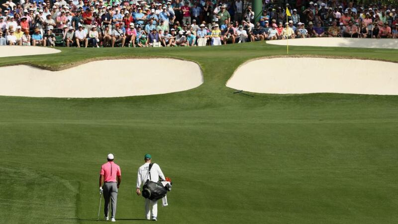 The seventh green is surrounded by five bunkers.