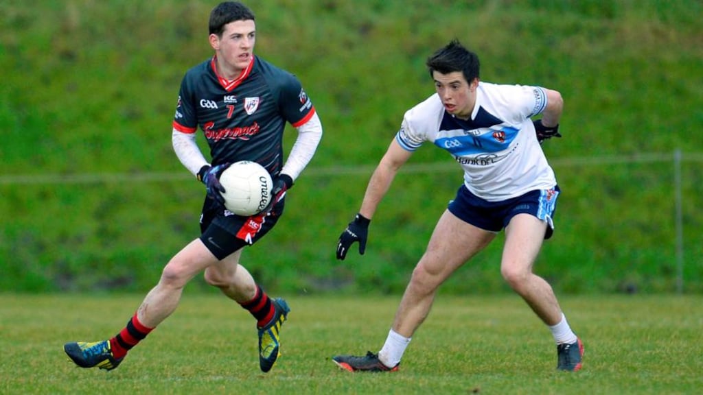 Ronan O’Neill, right, seen here in action for UUJ against IT Sligo’s Paul Varley in the Sigerson Cup, will play at left corner forward for Tyrone against Mayo on Sunday. Photograph: Russell Pritchard/Inpho/Presseye