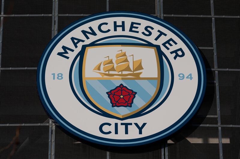 The Manchester City club crest at the Etihad stadium. Photograph: Adam Vaughan/EPA