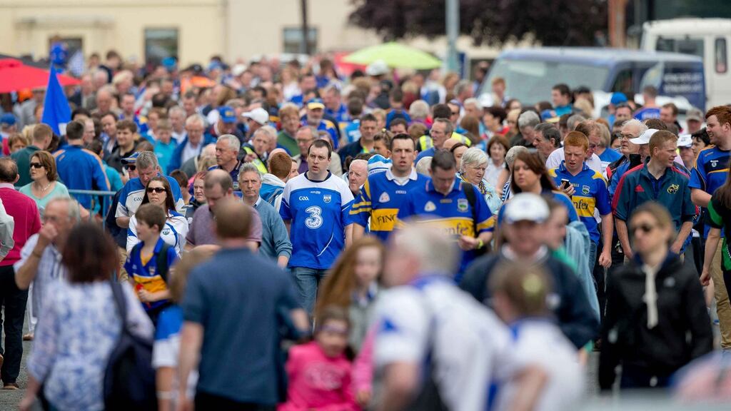 Tipperary and Waterford fans on their way to Semple Stadium for last year’s Munster hurling final. Photograph: Morgan Treacy/Inpho.