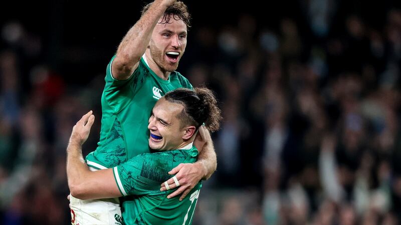 Hugo Keenan celebrates at the final whistle with James Lowe. Photograph: Bryan Keane/Inpho
