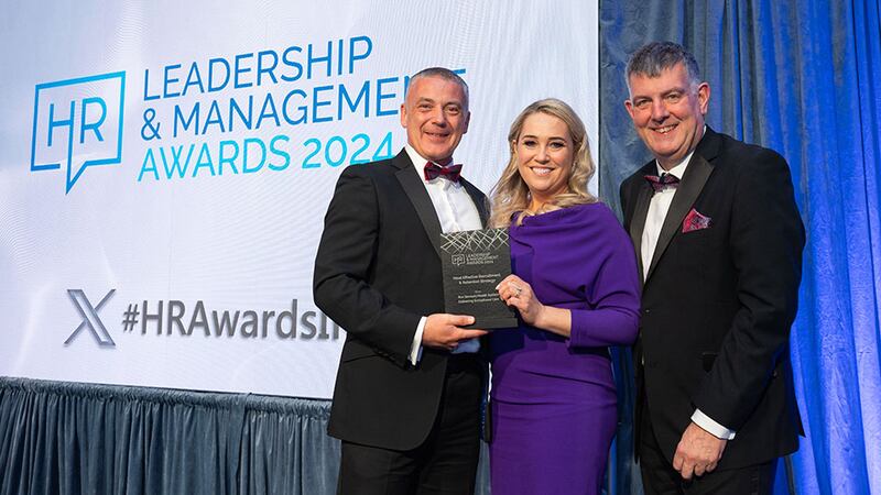 Terry Spence, One4all rewards, director of sales, presents the most effective recruitment and retention strategy award to Anne Marie Kennedy, Bon Secours Health System