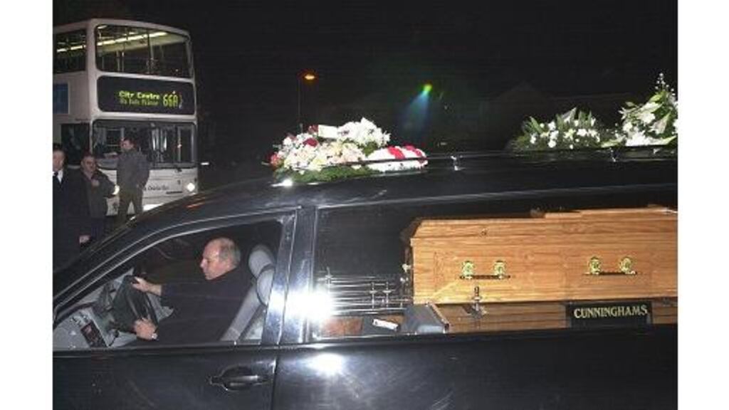 The remains of Mr Kevin Garry, who worked in a Salvation Army hostel, arriving at St Charles Borromeo Church in Leixlip last night