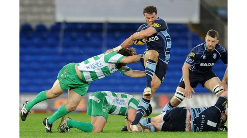 Cardiff's Jamie Roberts drives through the Treviso defence in their Magners League win at the Cardiff City Stadium. Photograph: James Crombie/Inpho