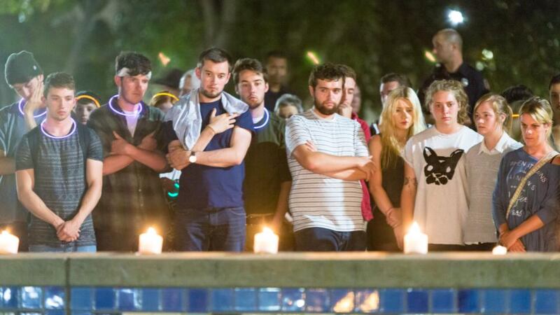 Participants at a vigil for the victims of About 200 people attended the month’s mind vigil just two blocks from where six students were killed and seven were injured in the tragedy on June 16th. Photograph: Martin Lacey.