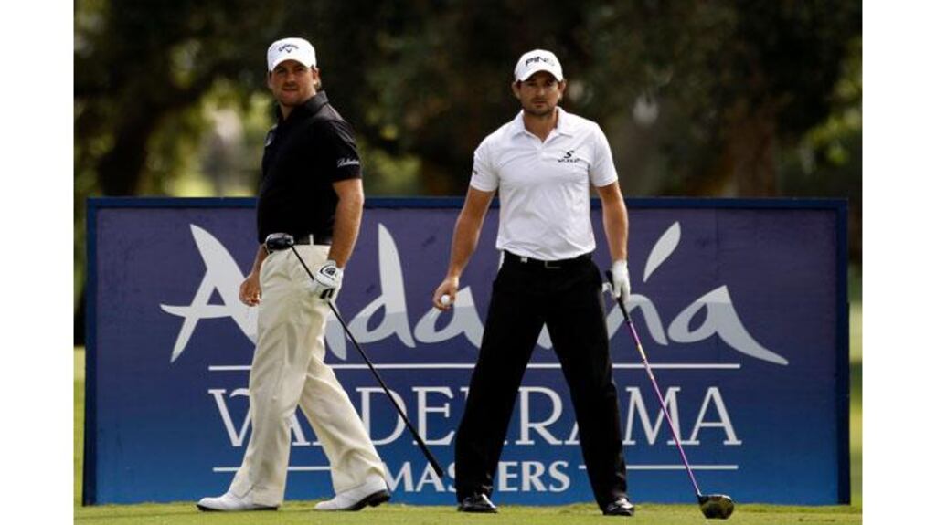 Graeme McDowell (L) and Gareth Maybin of Northern Ireland stand on the second hole during the final round of the Andalucia Valderrama Masters in Sotogrande, Spain (Photograph: Marcelo del Pozo/Reuters)