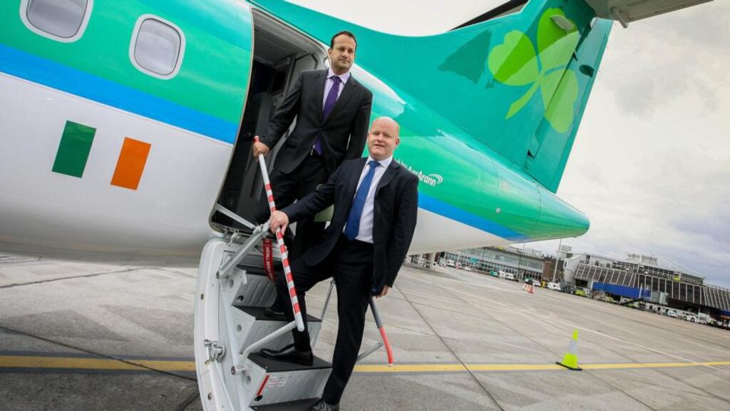 Minister for Transport, Tourism and Sport, Leo Varadkar gets a tour of the first of eight new Aer Arann aircrafts from Seán Brogan, Interim CEO, Aer Arann at Dublin Airport. Photograph: Maxwell’s