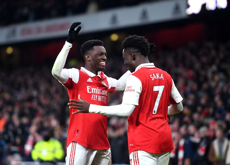 Arsenal's Eddie Nketiah celebrates with teammate Bukayo Saka after scoring their third goal against Manchester United at the Emirates Stadium on Sunday. Photograph: Andy Rain/EPA-EFE
