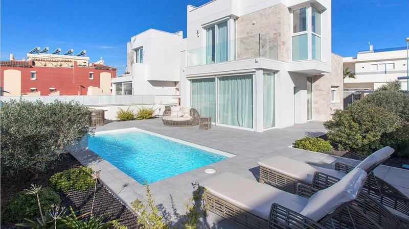 This three-bedroom villa in Aguas Nuevas in Spain has great views from its large rooftop terrace