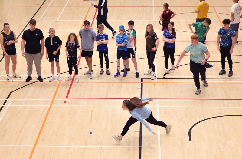 Stephanie Walsh, Moycullen, plays Bertie Donohue, watched by other young players