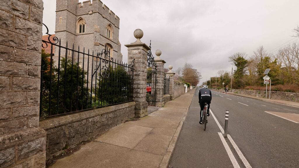 Bollards installed on the cycle lane outside the Howth Presbyterian church on the Howth Road will remain. Photograph: Alan Betson
