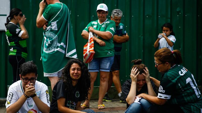 Supporters of the Brazilian football team Chapecoense gather at the Arena Conda Arena in Chapeco, Brazil, to perform a vigil in honour of the victims of the plane crash in La Union, Colombia. Photograph: Fernando Bizerra Jr/EPA