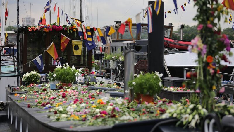 Floral tributes to Labour Party MP Jo Cox   on her houseboat in Wapping, east London. Photograph: Daniel leal-Olivas/AFP/Getty Images