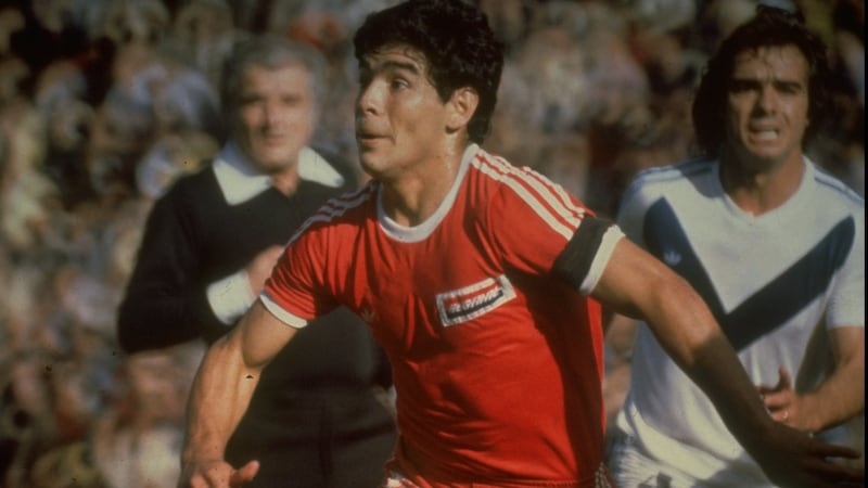 Diego Maradona in action for Argentinos Juniors. Photograph:  Allsport