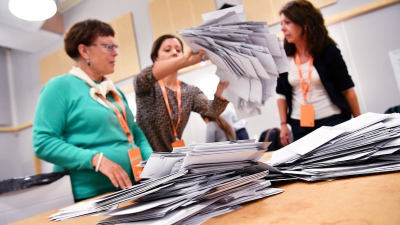 Electoral officials prepare to count ballots at a polling station in Malmo, Sweden, on Sunday. Photograph: Johan Nilsson/TT News Agency/via Reuters