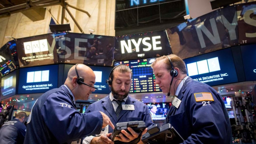 Traders work on the floor of the New York Stock Exchange. Photograph: Reuters/Brendan McDermid