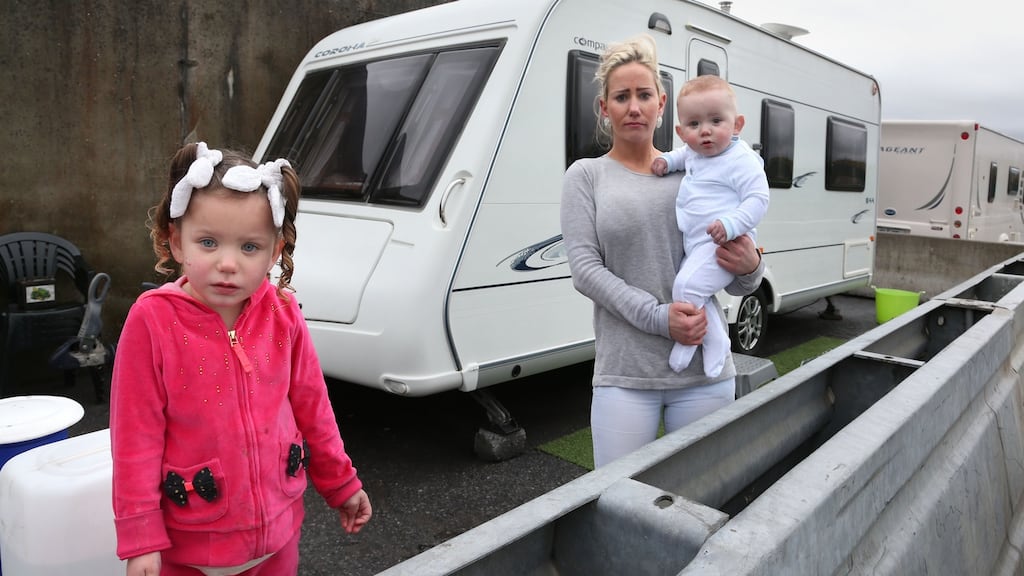 Eileen Cleary with her daughter Leona (3) and nine-month-old son Ricko: The family, along with 10 others,     is due to register as homeless   when the notice to quit the entrance to Barna Recycling on the Headford road in Galway comes into force on Friday. Photograph: Joe O’Shaughnessy.