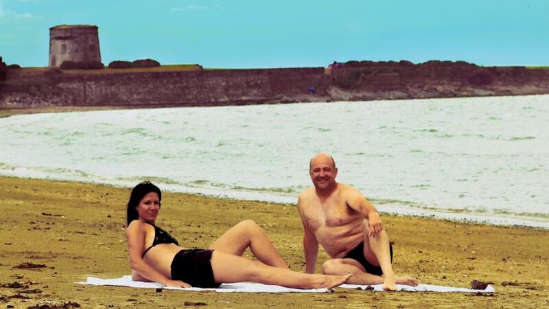 Kasia Brandys and Paul Lambkin re-create the John Hinde postcard, complete with filter effect. Photograph: Nick Bradshaw/Irish Times Premedia