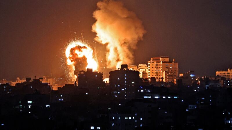 Fire billows from Israeli air strikes in the Gaza Strip on Monday. Israel launched deadly air strikes on Gaza in response to a barrage of rockets fired by the Islamist movement Hamas. Photograph: Mahmud Hams/AFP via Getty Images