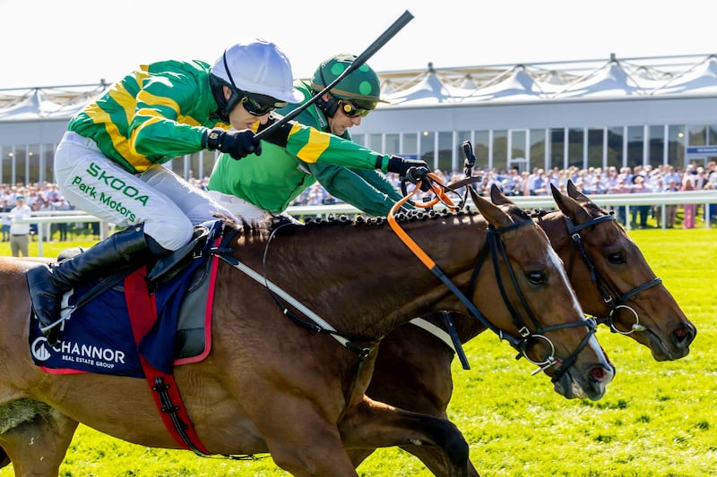Paul Townend on Jasmin De Vaux gets up to beat Mark Walsh on Honesty Policy to win the the Channor Real Estate Group Novice Hurdle at Punchestown. Photograph: Morgan Treacy/Inpho