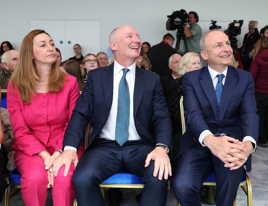 Jim Gavin with his wife Jennifer and Taoiseach Micheál Martin at the launch of his presidential campaign at the Exo Building in Dublin. Photograph: Damien Eagers/Fianna Fáil handout/PA