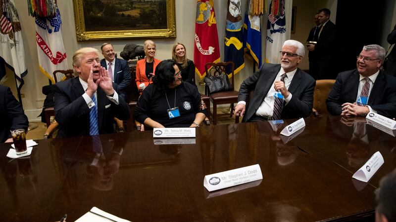 President Donald Trump yells for reporters to return to the Roosevelt Room to hear a union leader praise him, at the White House in Washington last January. Photograph: Doug Mills/The New York Times