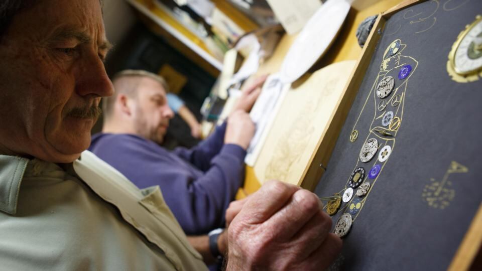 Joe Grant puts final pieces to a piece with Pawel Zakrzewski behind at the Men’s Shed in Portlaoise. Photograph: Jeff Harvey/HR Photo Joe Grant puts final pieces to a piece with Pawel Zakrzewski behind at the Men’s Shed in Portlaoise. Photograph: Jeff Harvey/HR Photo