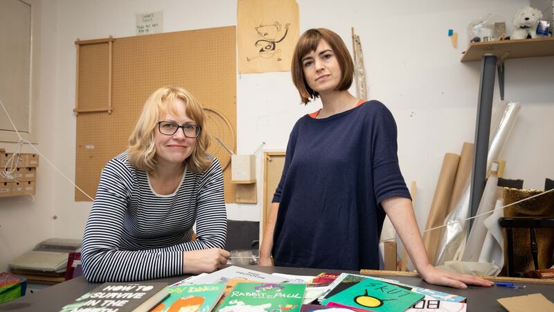 Debbie Jenkinson and Sarah Bowie with an array of small-press publications, demonstrating the breadth of comic-creation talent in the country. Photograph: Tom Honan