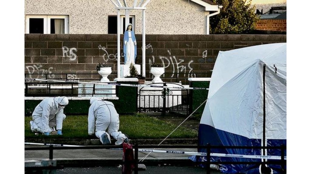 Gardaí examine the scene of Saturday night's shooting on Ferrycarrig Road, Coolock, Dublin. Photograph: Dara Mac Dónaill