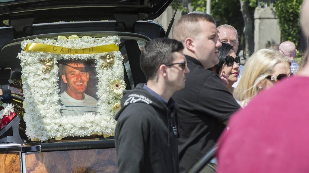 Mourners attend the funeral of Garth Hutch in June, 2016. Photograph: Brenda Fitzsimons