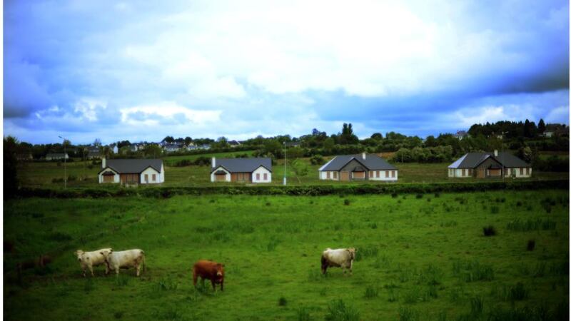 Going nowhere: boarded-up houses in a ghost development in Co Roscommon. Photograph: Bryan O’Brien
