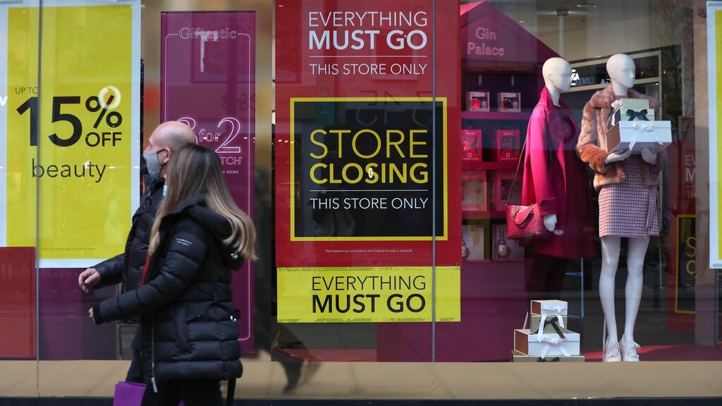 People walk past Debenhams on Oxford Street in London. Photograph: Luciana Guerra/PA Wire
